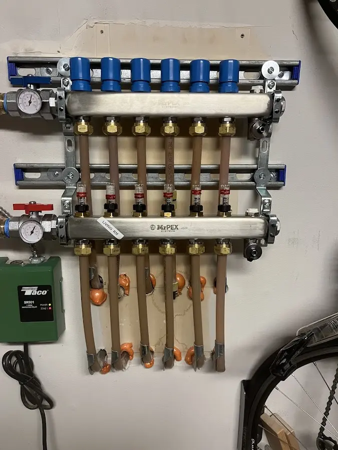 Plumber performing Leak Detection at a residential property in East Hartford